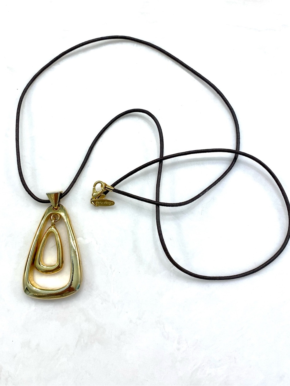Soho Design Gold-Tone Layered Teardrop Pendant on Dark Cord